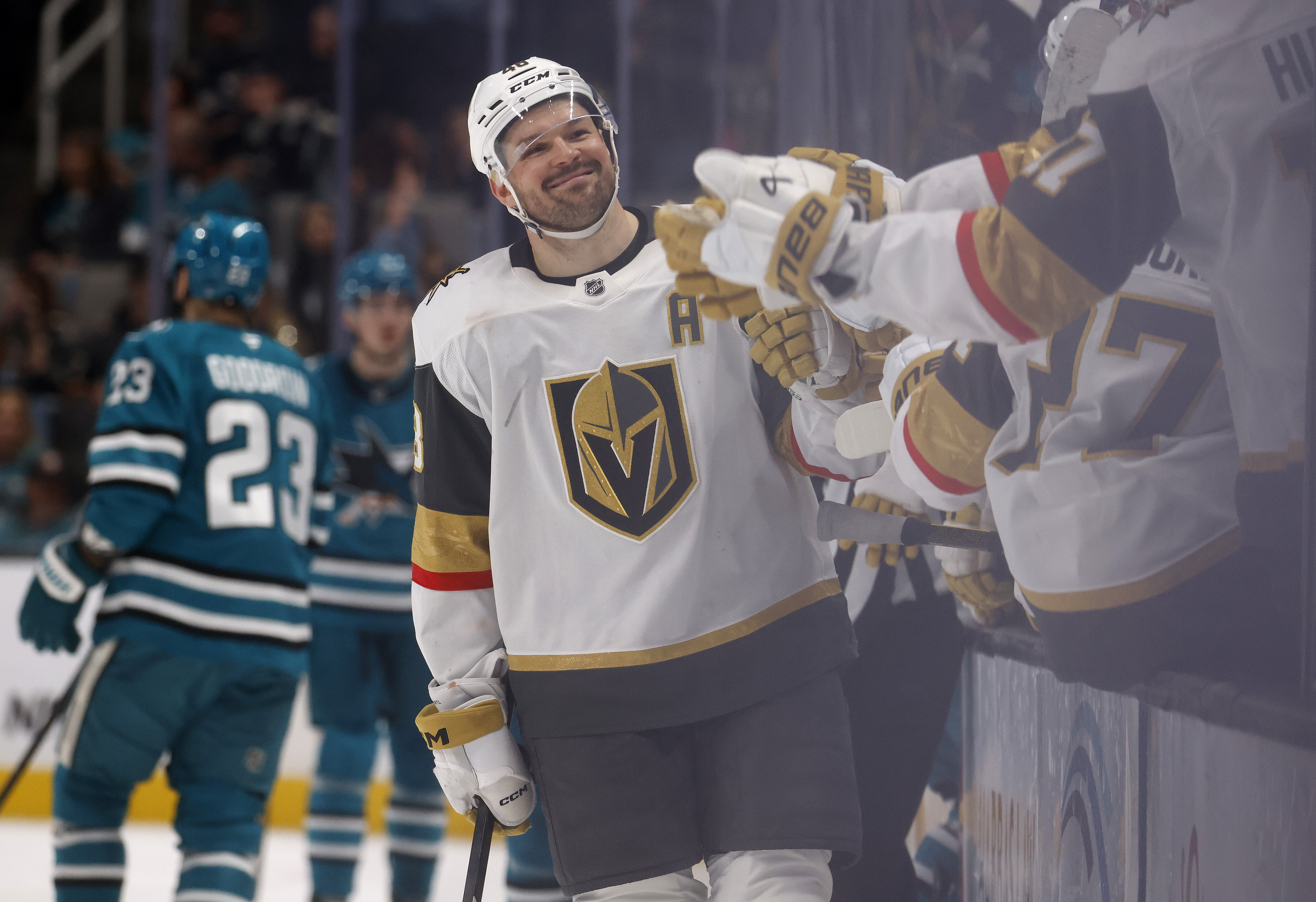 Vegas Golden Knights’ Tomas Hertl (48) high-fives the bench after...