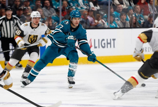 San Jose Sharks' Michael Misa (77) passes the puck against the Vegas Golden Knights in the third period at the SAP Center in San Jose, Calif., on Sunday, Jan. 11, 2026. (Nhat V. Meyer/Bay Area News Group)
