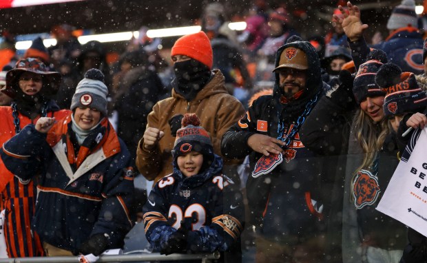 Fans prepare before the Chicago Bears face the Los Angeles Rams on Jan. 18, 2026, in an NFC divisional playoff game at Soldier Field. (Brian Cassella/Chicago Tribune)