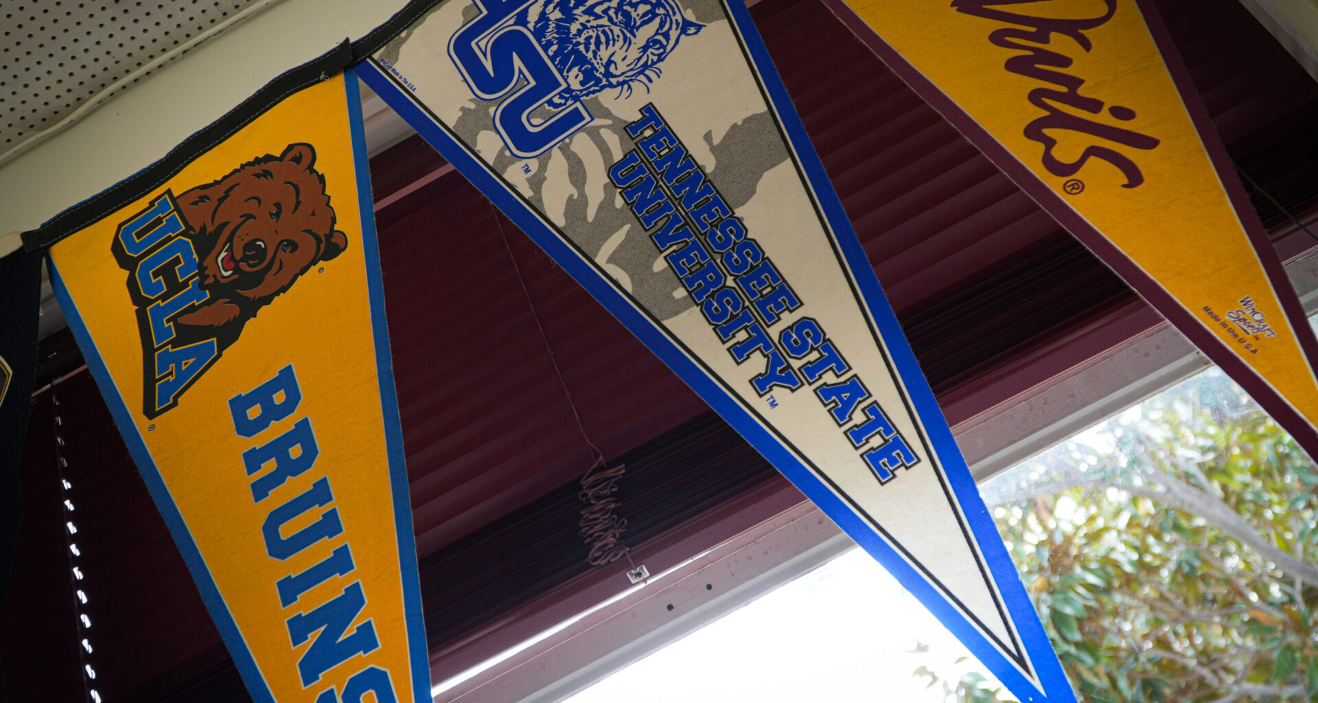 College flags at West Campus High School in Sacramento.