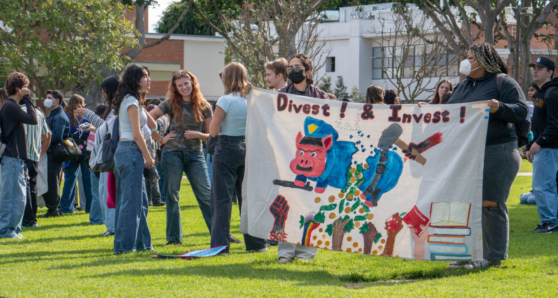 Students walkout on campus to protest ICE, call for divestment