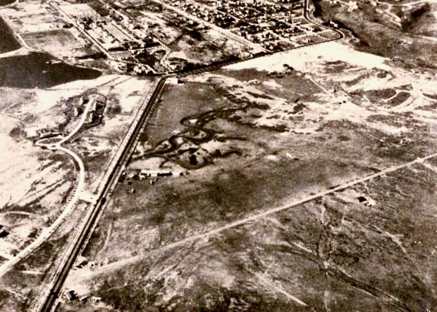 Dutch Flats is pictured in 1925, looking south-southwest. The long straightaway is Tide Street (now Barnett Avenue) veering west on Lytton Street. Ryan Air Field is in the center. The wagon track going past the chicken ranch in the foreground would one day be Midway Drive. (Jimmy Erickson)