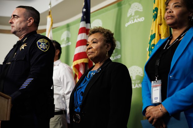 Oakland Mayor Barbara Lee looks on as Oakland police Assistant Chief James Beere, who has been appointed as the interim Oakland Police Chief, speaks during a press conference on Friday, Nov. 14, 2025, in Oakland, Calif. (Dai Sugano/Bay Area News Group)