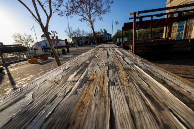 Deteriorated tables stand on a vacant restaurant patio at Jack London Square in Oakland, Calif.,on Wednesday, Jan. 29, 2026. Once a popular tourist attraction featuring Jack London's cabin, Franklin D. Roosevelt's presidential yacht, restaurants, lawns, a ferry terminal, a waterfront hotel, and amazing views of the Port of Oakland and San Francisco Bay, the area has become an isolated destination marked by vacant storefronts and a shortage of visitors. (Ray Chavez/Bay Area News Group)