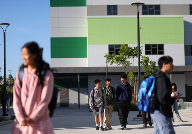 Students arrive on the campus of Emerald High School for the first day of school on Tuesday, Aug. 13, 2024, in Dublin, Calif.  The campus is still under construction and is the first new comprehensive high school to open in Alameda County in the last 50 years.  (Aric Crabb/Bay Area News Group)