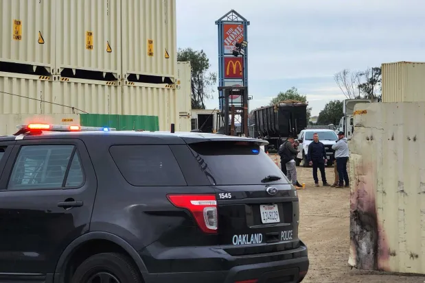 Federal and local authorities comb through evidence at a property on the 4200 block of Alameda Avenue in East Oakland on Wednesday, Jan. 21, 2026. (Jakob Rodgers/Bay Area News Group)