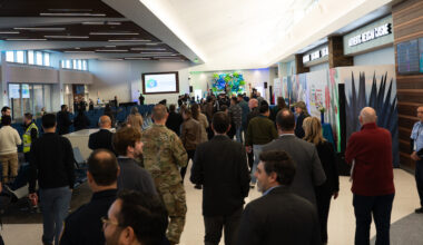 people in an airport concourse