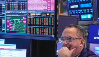 Stocks of credit card companies slump as Wall Street overall drifts