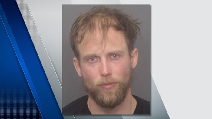 Oakland County man arrested after neighbors report squealing dog to 911