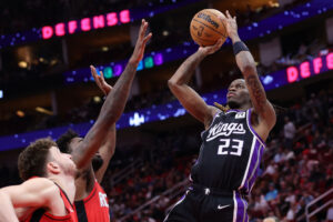 HOUSTON, TEXAS - MARCH 01: Keon Ellis #23 of the Sacramento Kings shoots the ball against the Houston Rockets during the first half at Toyota Center on March 01, 2025 in Houston, Texas. NOTE TO USER: User expressly acknowledges and agrees that, by downloading and or using this photograph, User is consenting to the terms and conditions of the Getty Images License Agreement. (Photo by Alex Slitz/Getty Images)