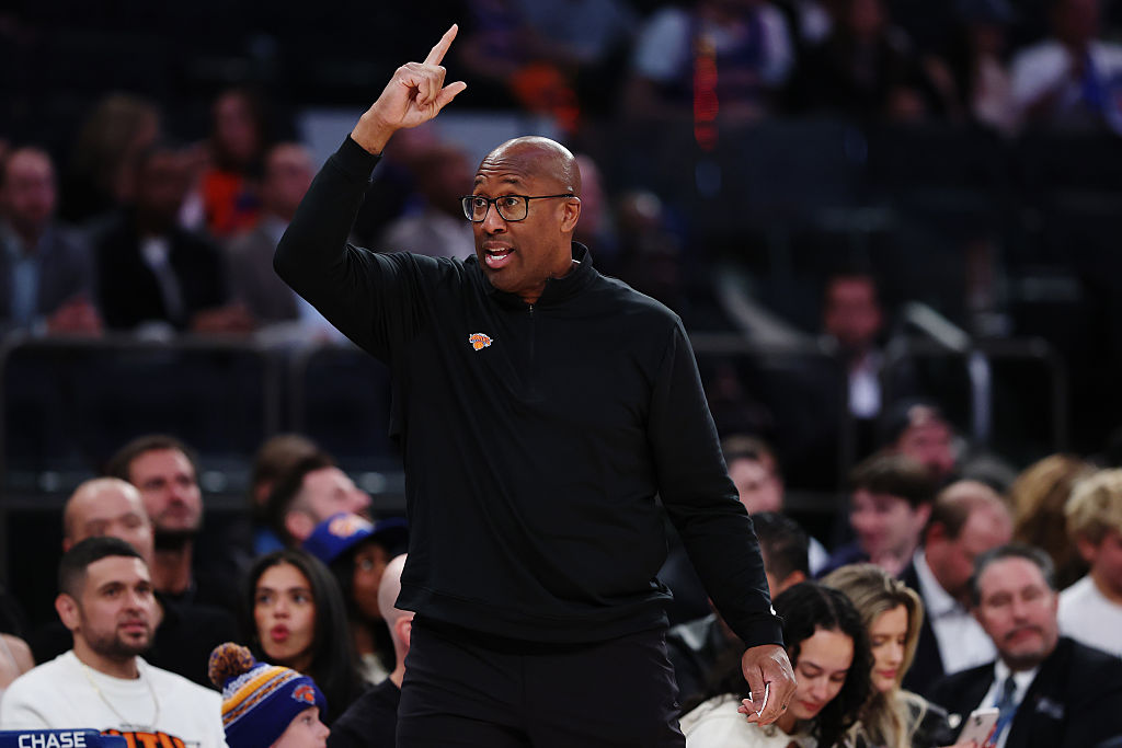 Mike Brown interacts with Sacramento Kings following rematch