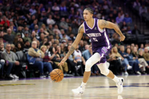 SACRAMENTO, CALIFORNIA - NOVEMBER 12: Nique Clifford #5 of the Sacramento Kings dribbles the ball against the Atlanta Hawks at Golden 1 Center on November 12, 2025 in Sacramento, California. NOTE TO USER: User expressly acknowledges and agrees that, by downloading and/or using this photograph, user is consenting to the terms and conditions of the Getty Images License Agreement. (Photo by Ezra Shaw/Getty Images)