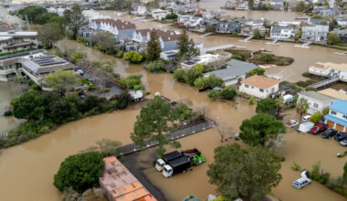 A street is inundated with floodwater during a King Tide event on Jan. 3 in Corte Madera, Calif. Credit: Stephen Lam/San Francisco Chronicle via Getty Images