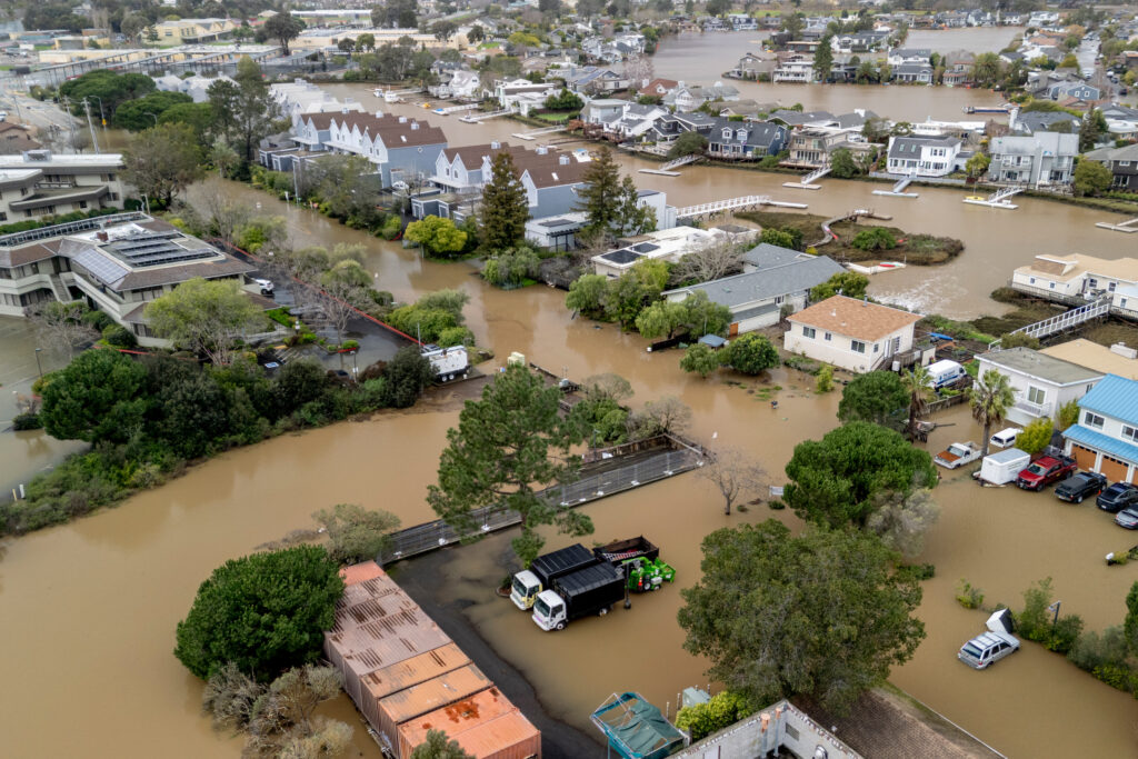 A street is inundated with floodwater during a King Tide event on Jan. 3 in Corte Madera, Calif. Credit: Stephen Lam/San Francisco Chronicle via Getty Images