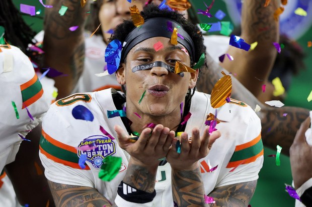 Miami defensive back Keionte Scott celebrates after their 24-14 victory over Ohio State in the Cotton Bowl on Wednesday, Dec. 31, 2025 in Arlington, Texas. The 10th-seeded Hurricanes advanced to the College Football Playoff semifinals. (Photo by Alex Slitz/Getty Images)
