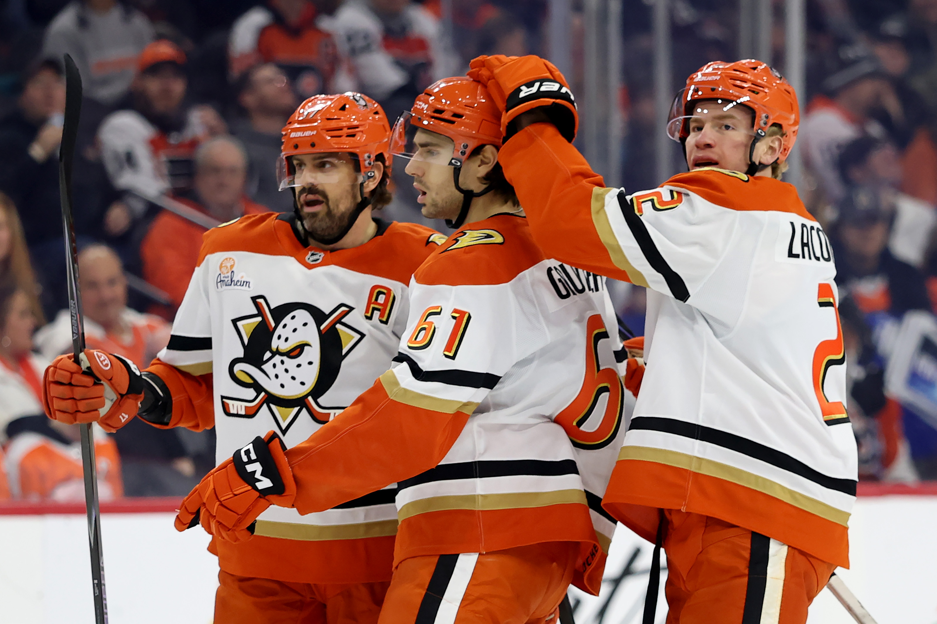 The Ducks’ Cutter Gauthier (61) celebrates his power-play goal with...