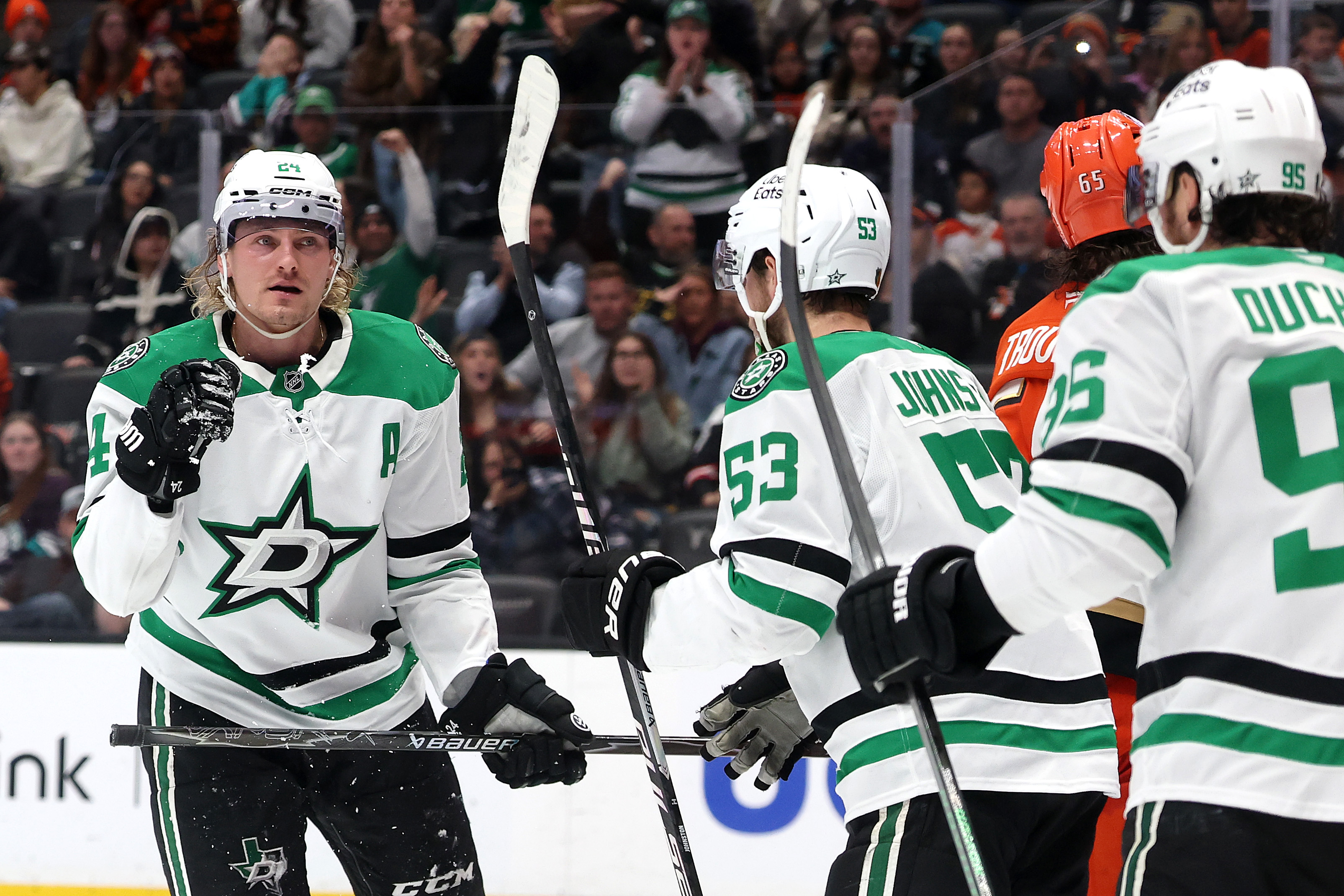 The Dallas Stars’ Roope Hintz, left, reacts after scoring a...