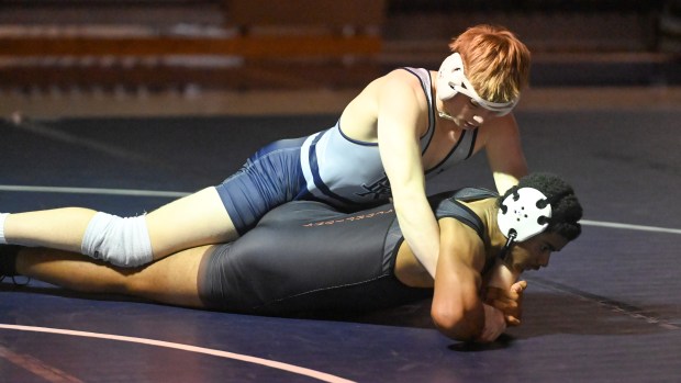 Marriotts Ridge's Max Hargrove controls Oakland Mills' Aiden York in the 175 pound weight class during a wrestling match at Marriotts Ridge High School on Thursday. (Brian Krista/Staff)