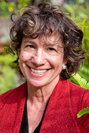 A photo of Jodi Halpern outside in a garden