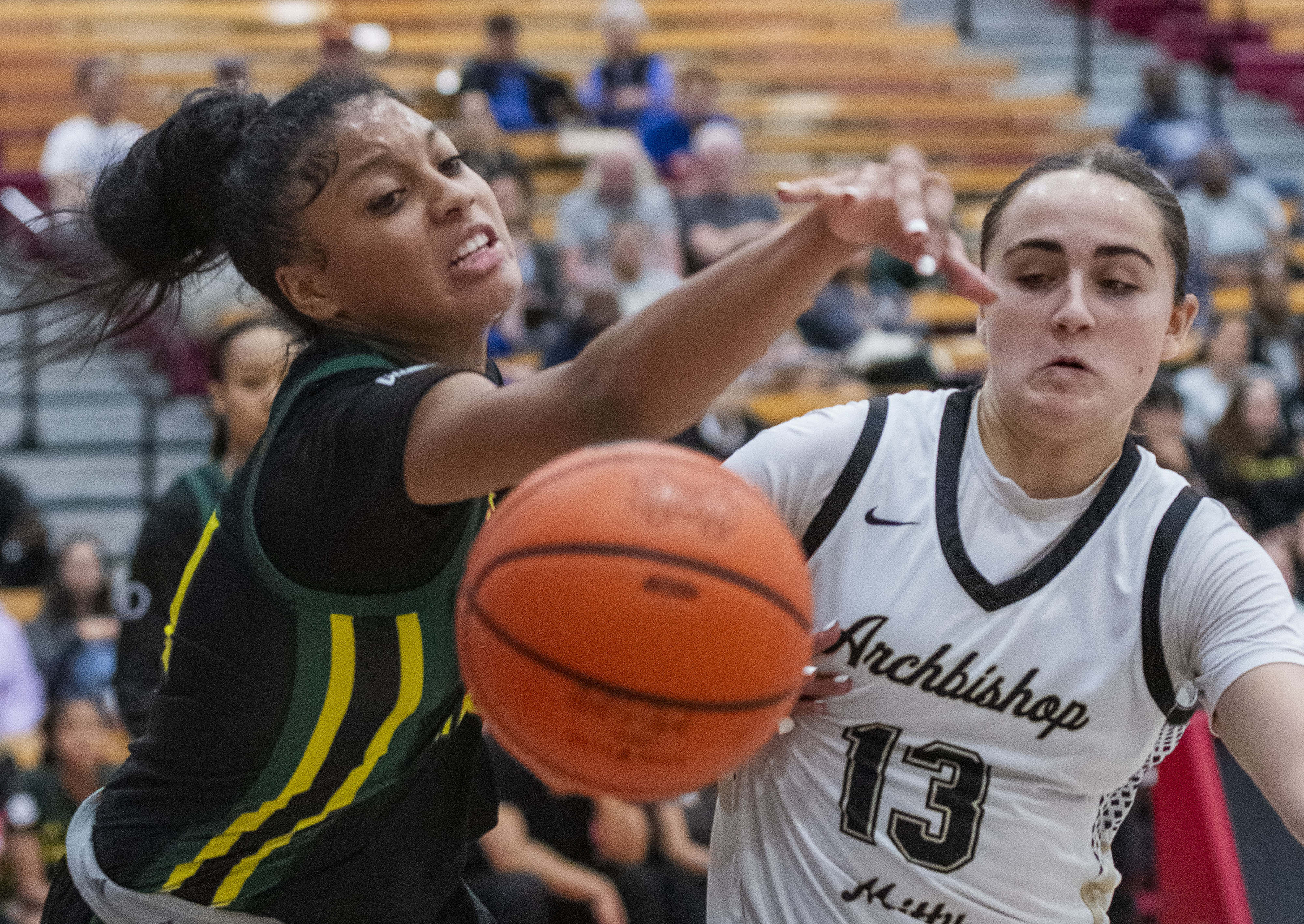 Ontario Christian’s Chloe Jenkins (21) and Archbishop Mitty’s Emma Cook...