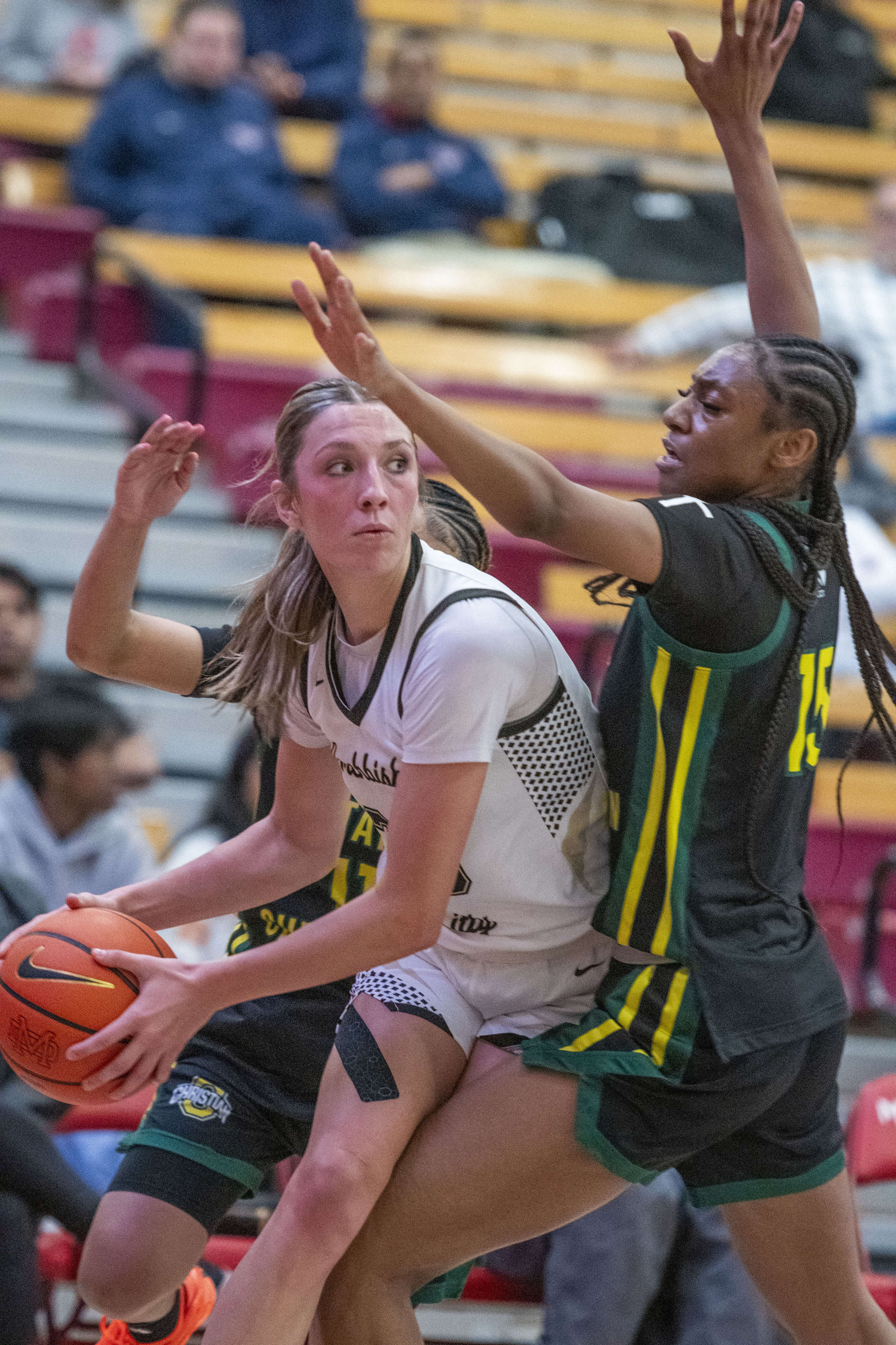 Archbishop Mitty’s McKenna Woliczko (20) looks to pass while being...