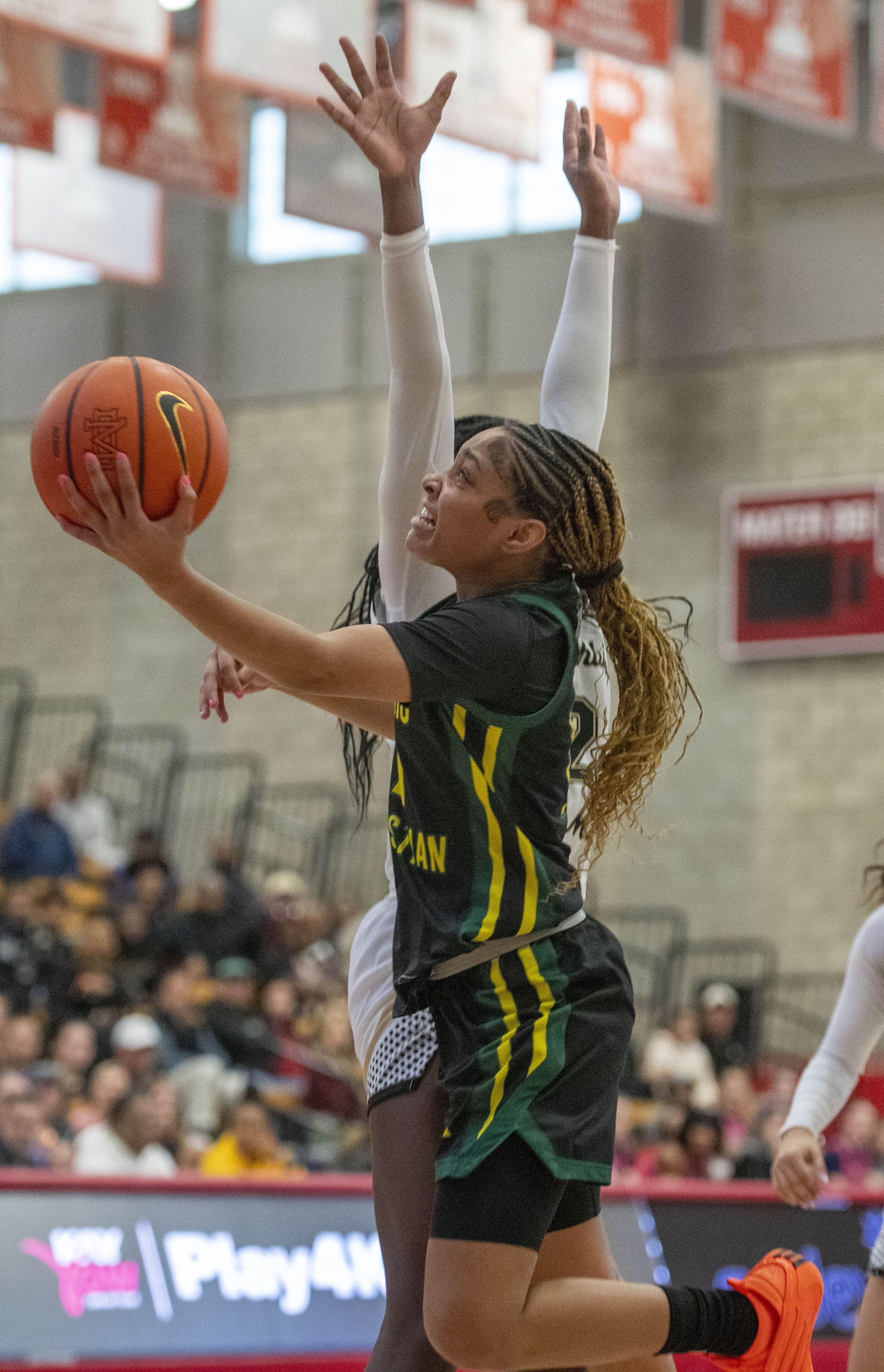 Ontario Christian’s Kaleena Smith (11) goes to the basket during...