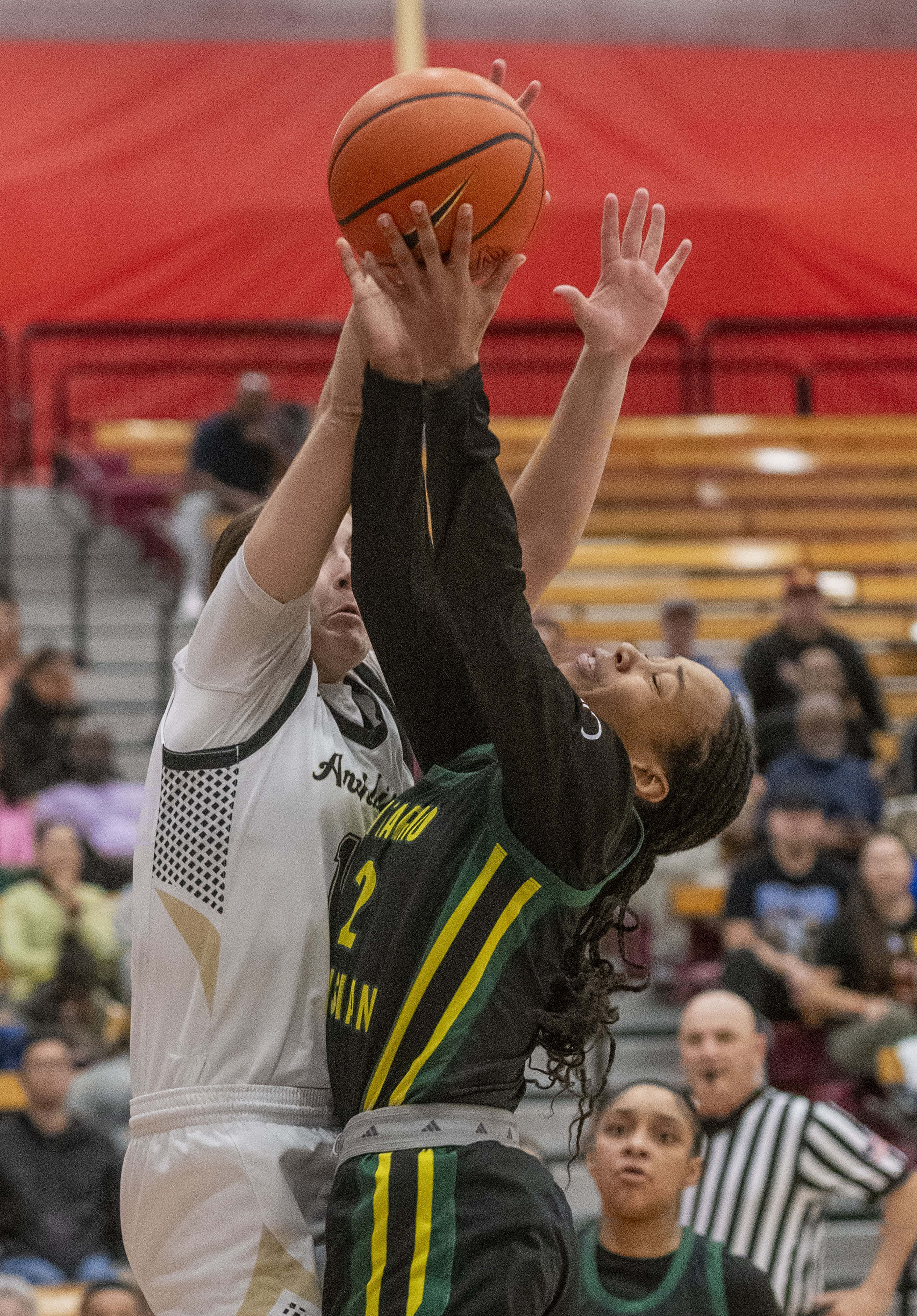 Ontario Christian’s Dani Robinson (2) is fouled going to the...