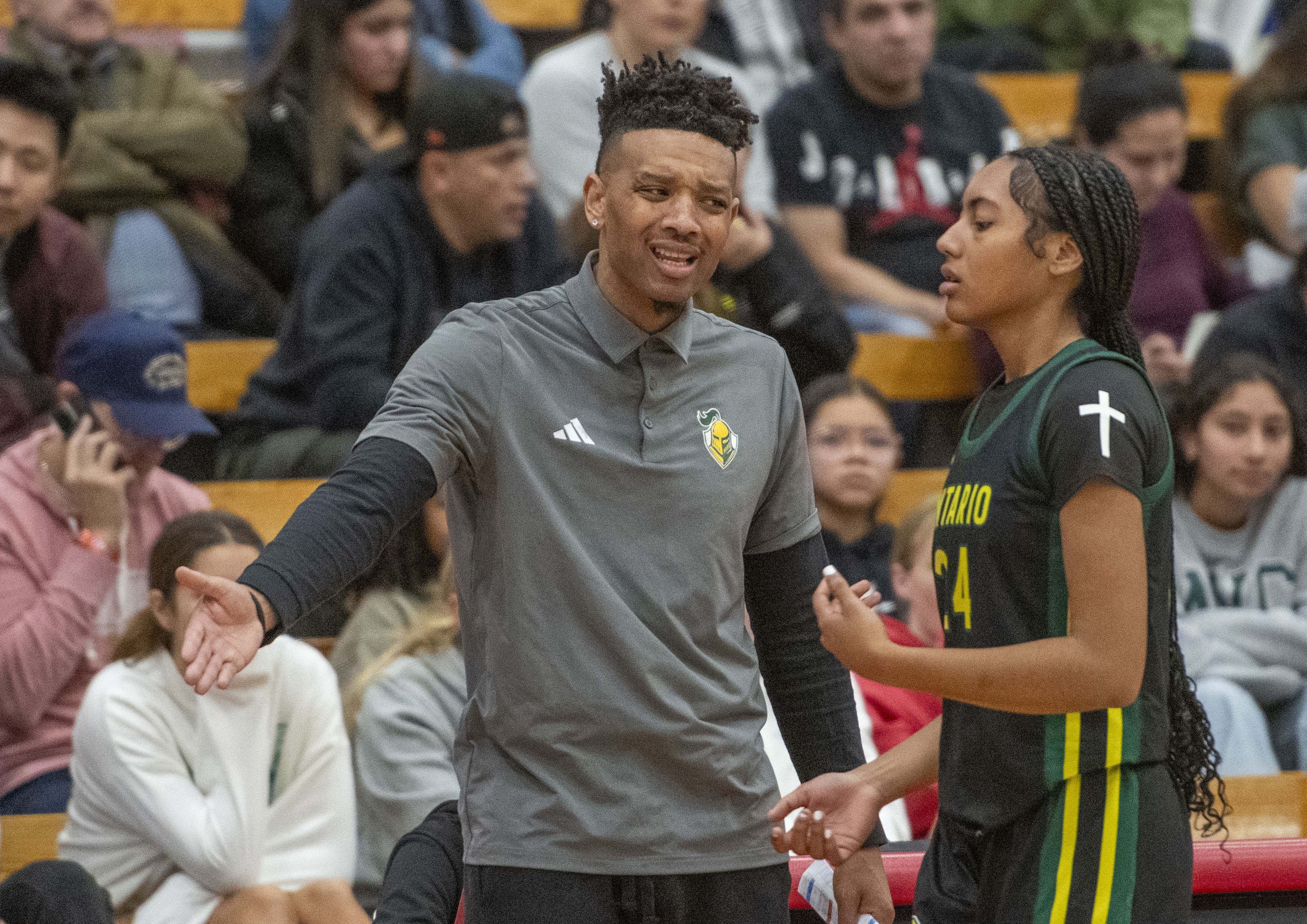 Ontario Christian’s head coach Aundre Cummings during a game between...