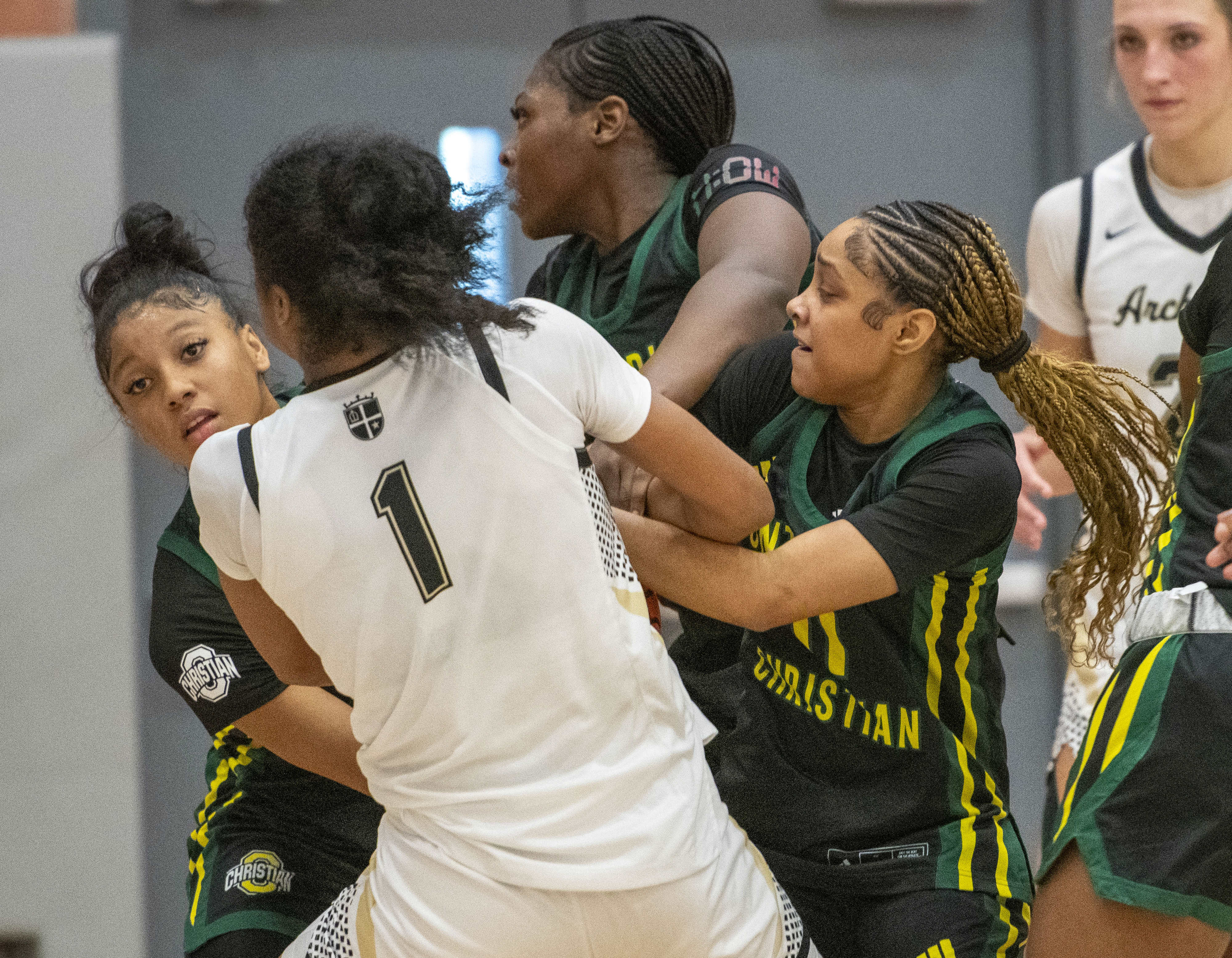 Ontario Christian’s players swarm Archbishop Mitty’s Maliya Hunter (1) for...