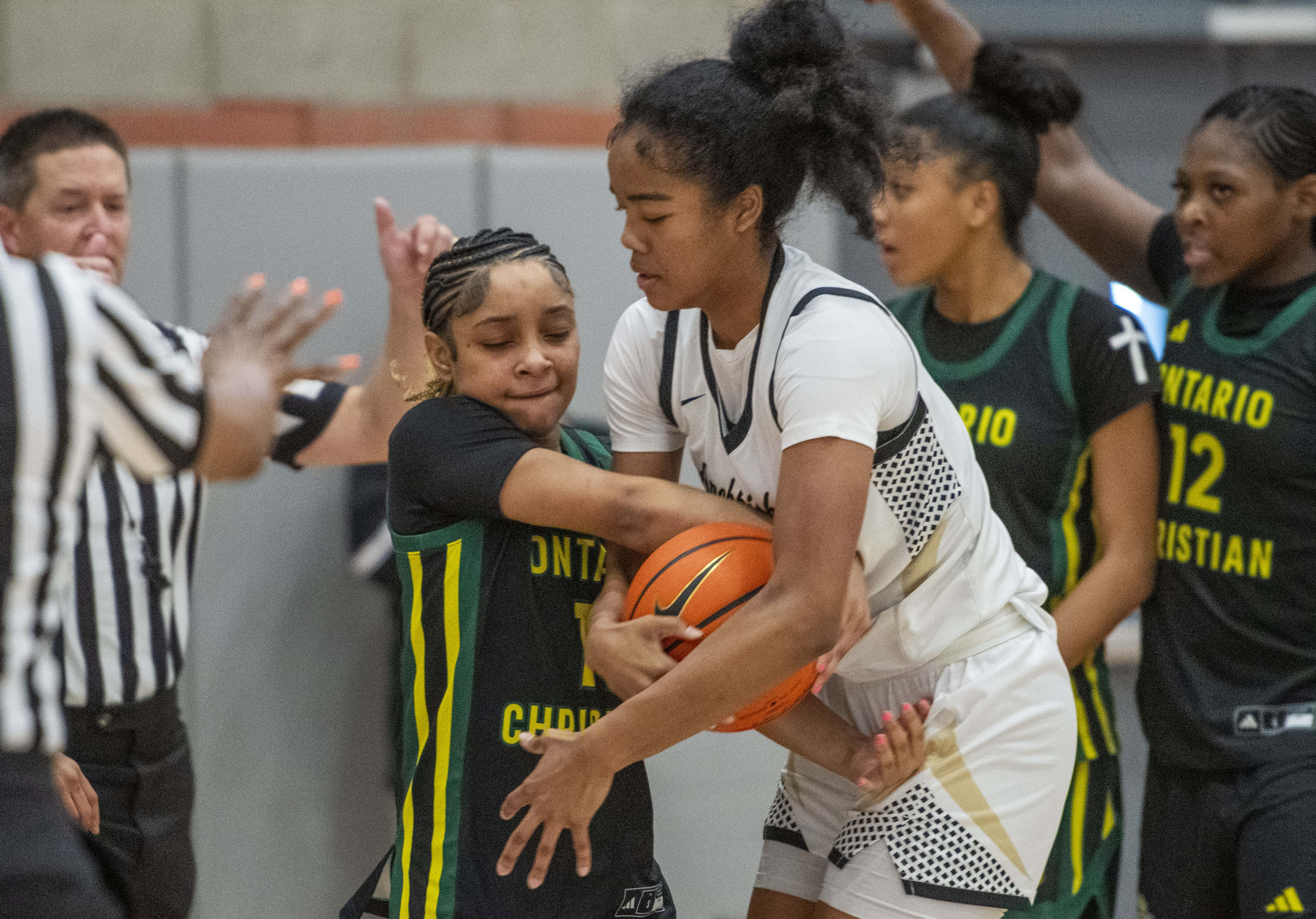 Ontario Christian’s Kaleena Smith (11) goes after the ball against...