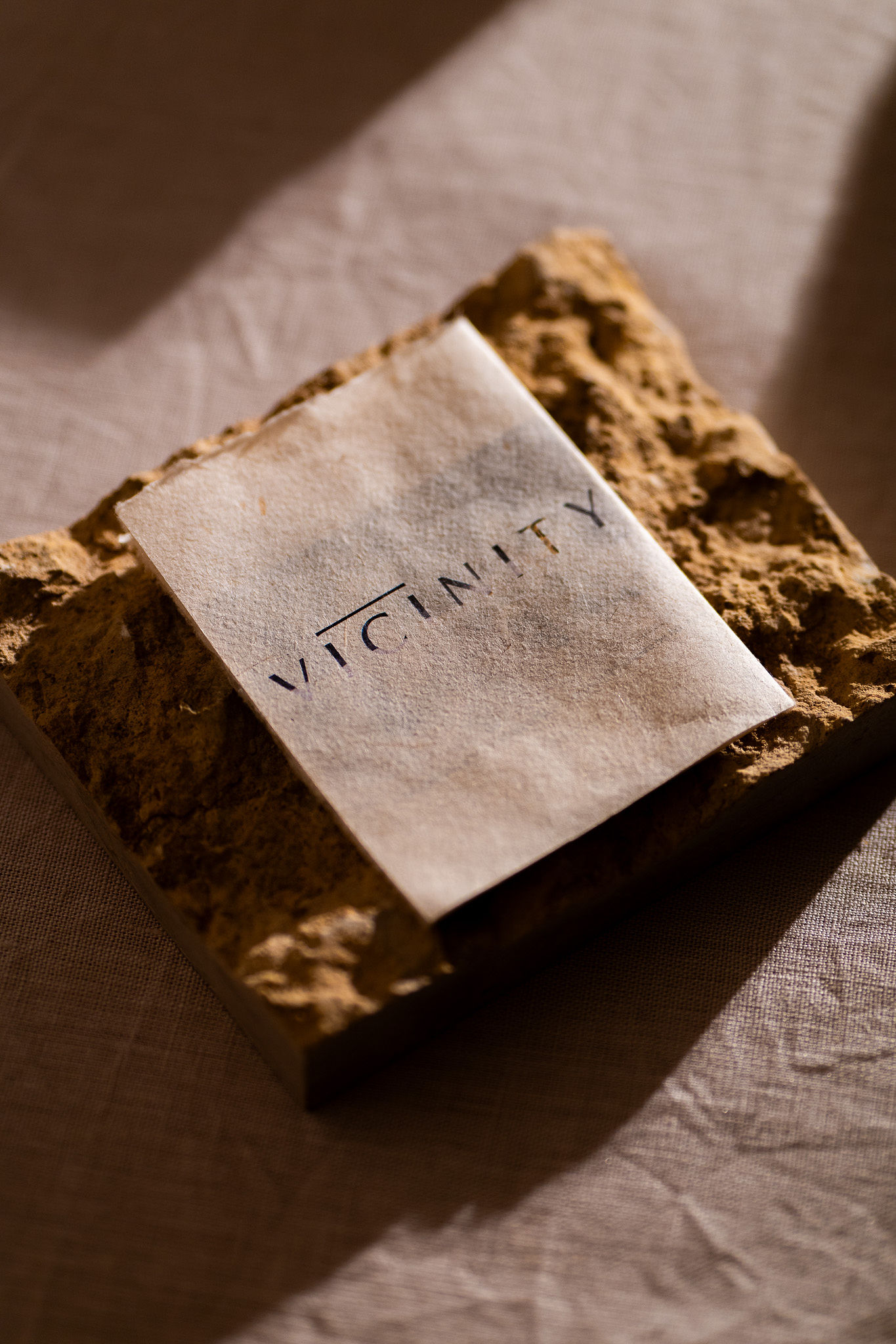A napkin on a rock that reads, “Vicinity,” at Vicinity in Los Gatos.