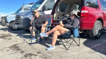 Tom Claxton (left) and his wife, Lisa, drive to Cardiff State Beach from Escondido so often they invested in an annual parking pass for convenience and savings, Cardiff, Calif., January 18, 2026. 