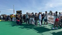 Families and their children gathered behind their team's banner for the ribbon cutting ceremony. Each team is named after a San Diego Padres player, Del Mar, Calif., january 25, 2026.