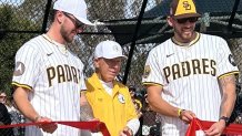Dan Engel (center) cuts the ribbon, Sunday, with help from Padres pitcher Joe Musgrove (right) and Padres outfielder, Jackson Merrill, at the newly named Padres Park, January 25, 2026.