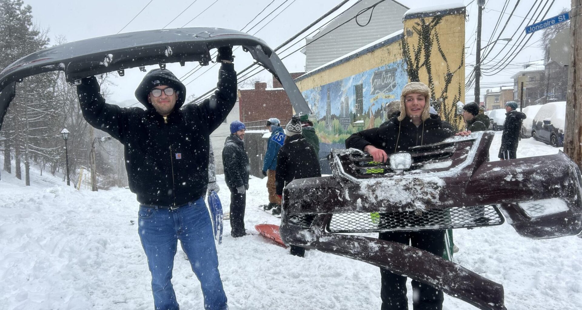 Oakland Snow Day: Students ski, sled down snowy streets