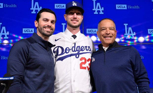 New Dodgers outfielder Kyle Tucker poses for photos with Dodgers general manager Brandon Gomes, left, and Dodgers manager Dave Roberts during his introductory press conference on Wednesday, Jan. 21, 2026, at Dodger Stadium. (Photo by Keith Birmingham, Pasadena Star-News/SCNG)