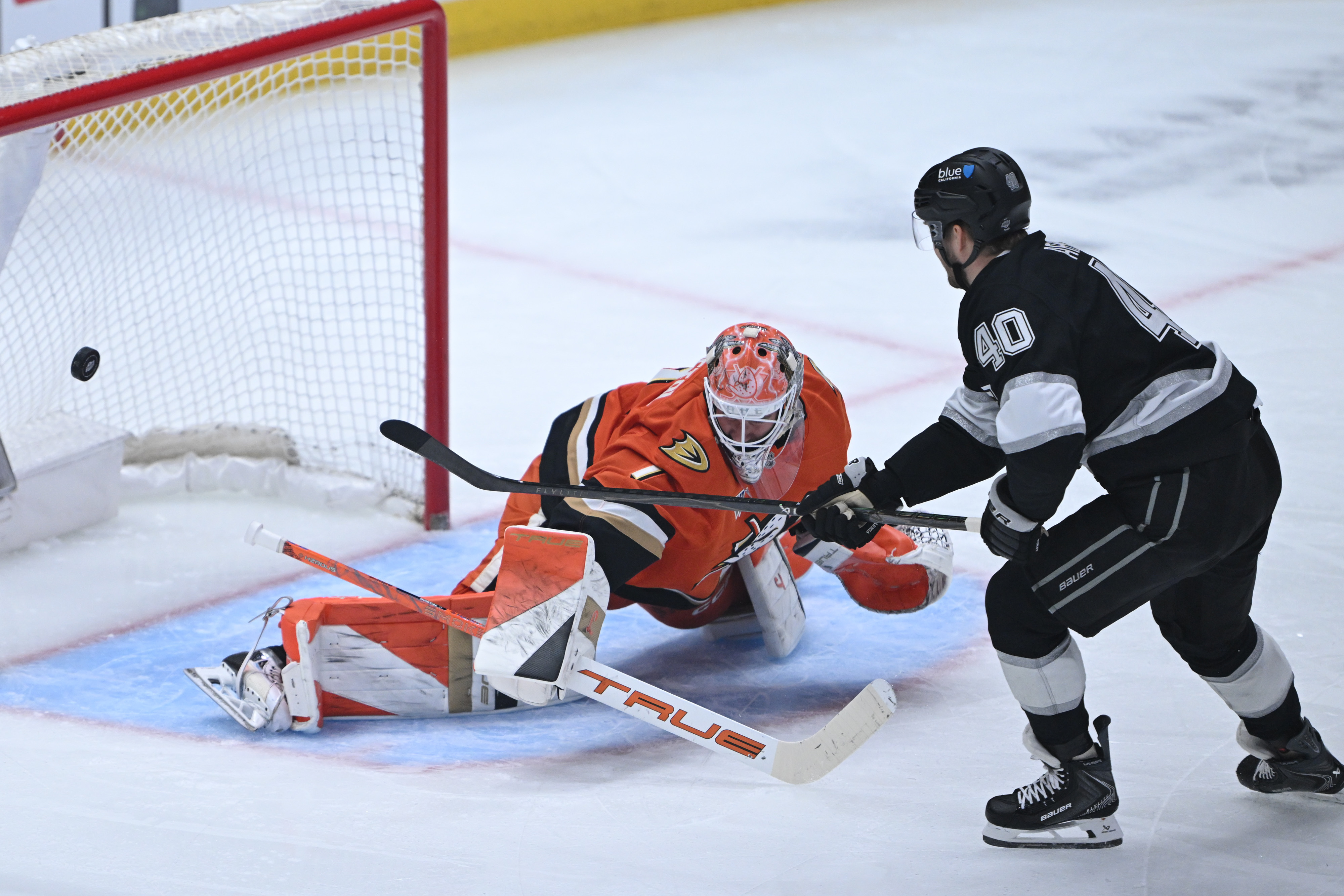 The Kings’ Joel Armia, right, sees his shot go wide...