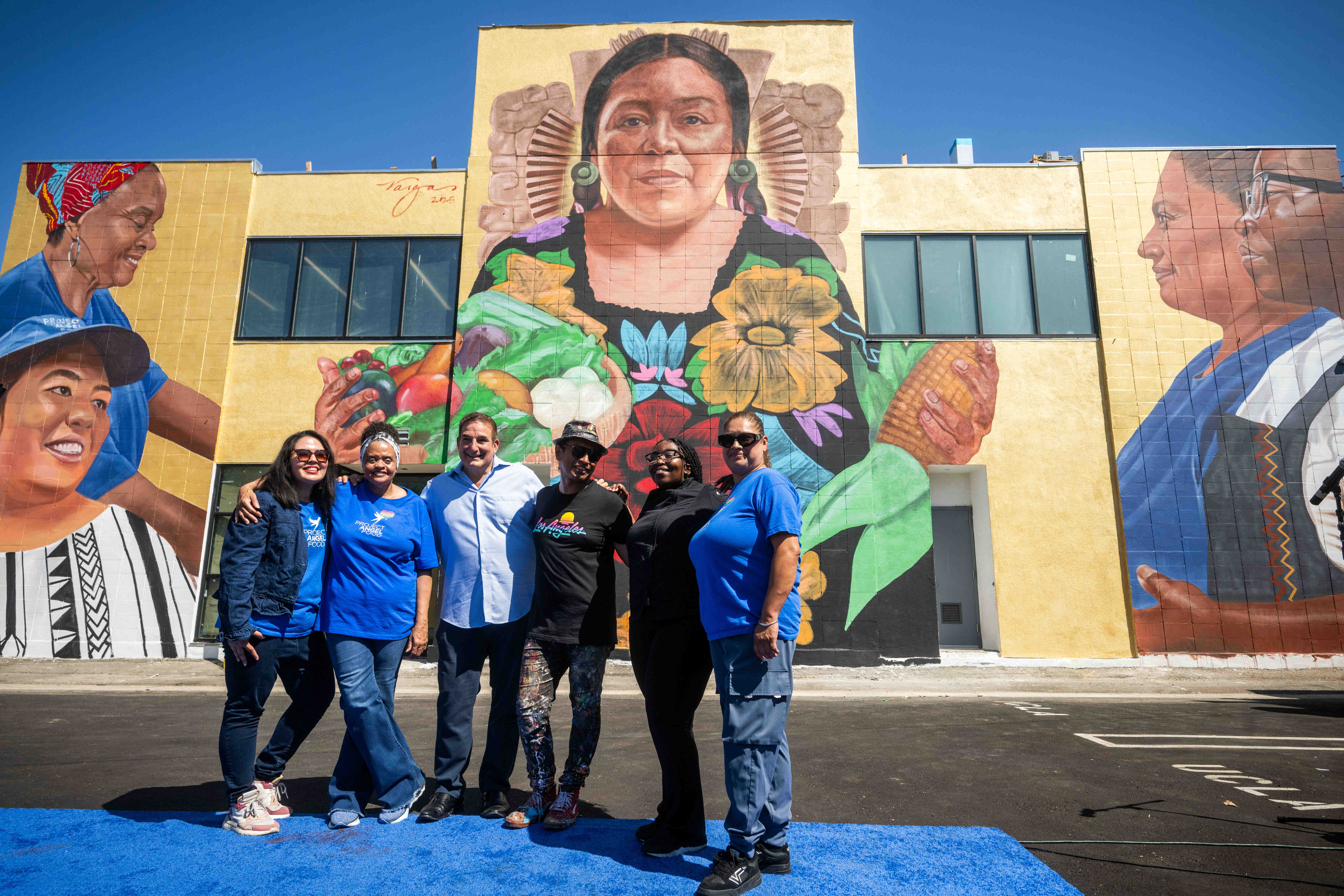 Richard Ayoub, CEO of Project Angel Food, and artist Robert...