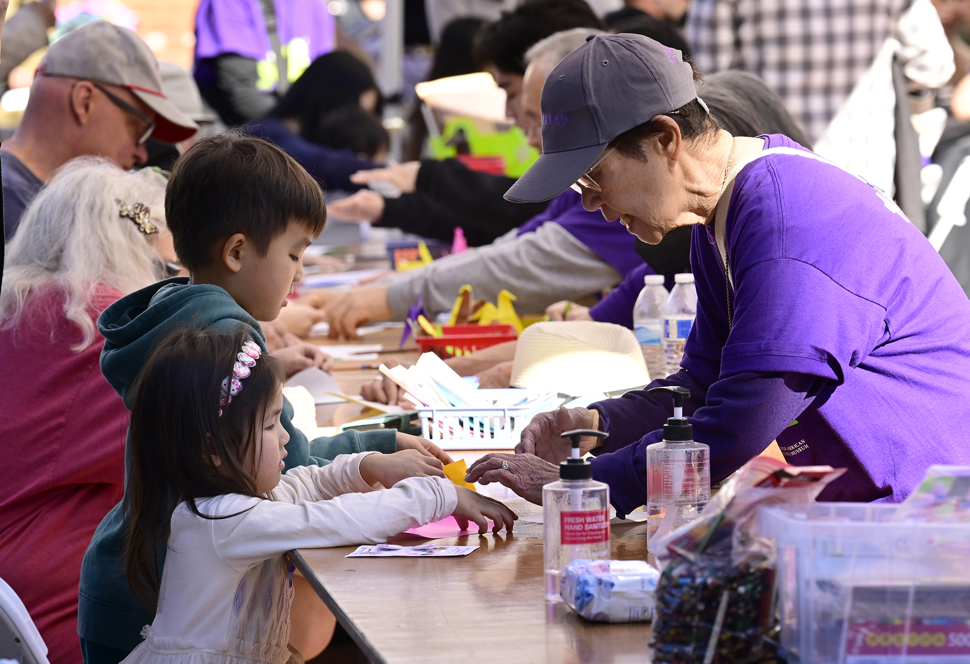 Children work on craft projects during the Japanese American National...