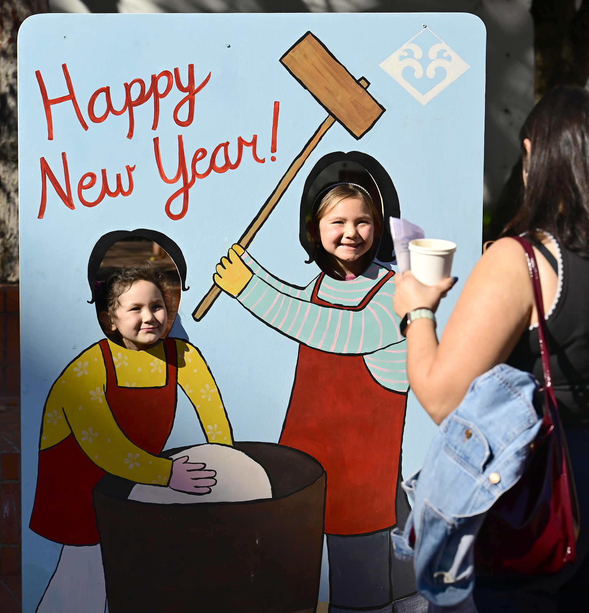 (L-r) Sadie,4, and Amara Takanashi,6, pose for a photo for...