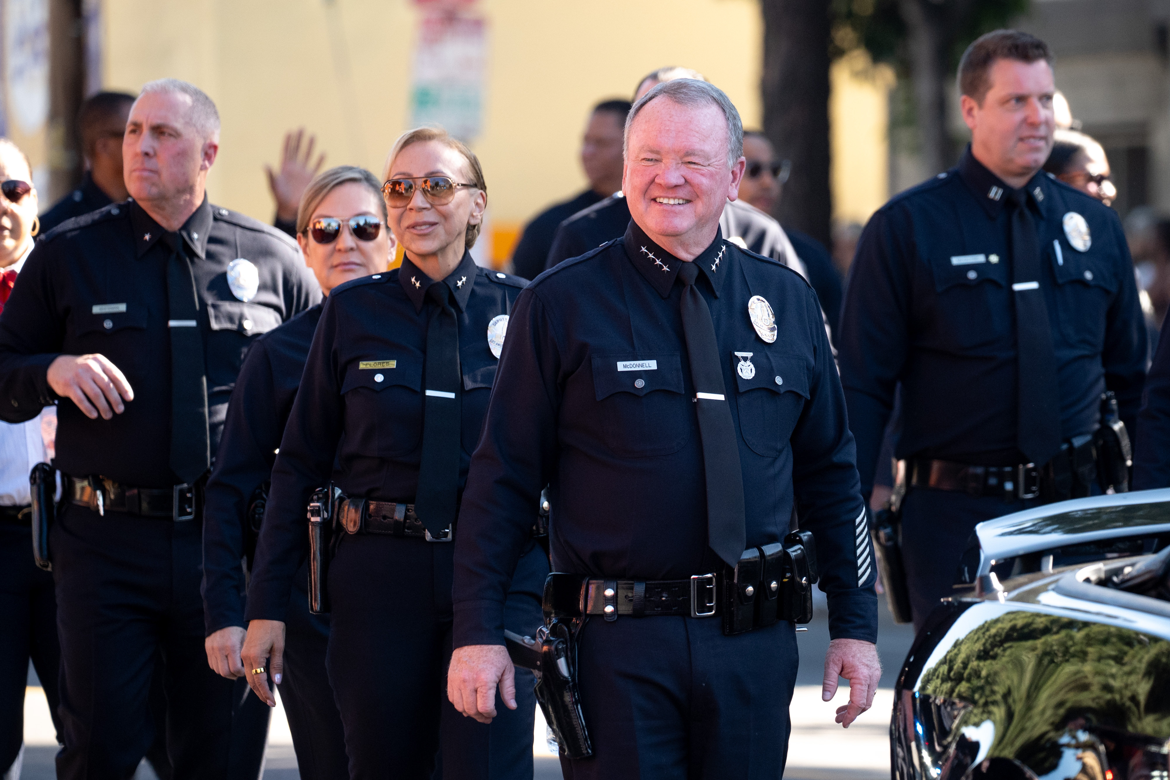 LAPD Chief Jim McDonnell and officers march in the Kingdom...