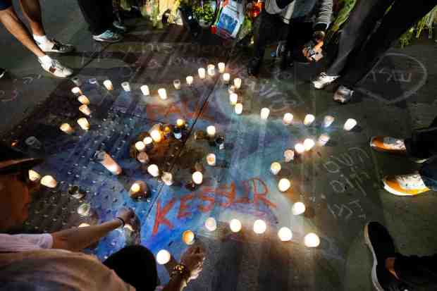 People gather at a makeshift memorial on Tuesday, November 7, 2023 for Paul Kessler, a 69-year-old Jewish man who died Monday after an altercation at a pro-Palestinian Israel-Hamas war protest in Westlake Village as he carried an Israeli flag on Sunday. (Photo by Sarah Reingewirtz, Los Angeles Daily News/SCNG)