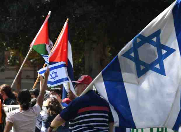 Israeli and Palestinian flags were flying during dual protests on the UCLA campus Sunday morning, April 28, 2024. (Photo by Gene Blevins/Contributing Photographer)