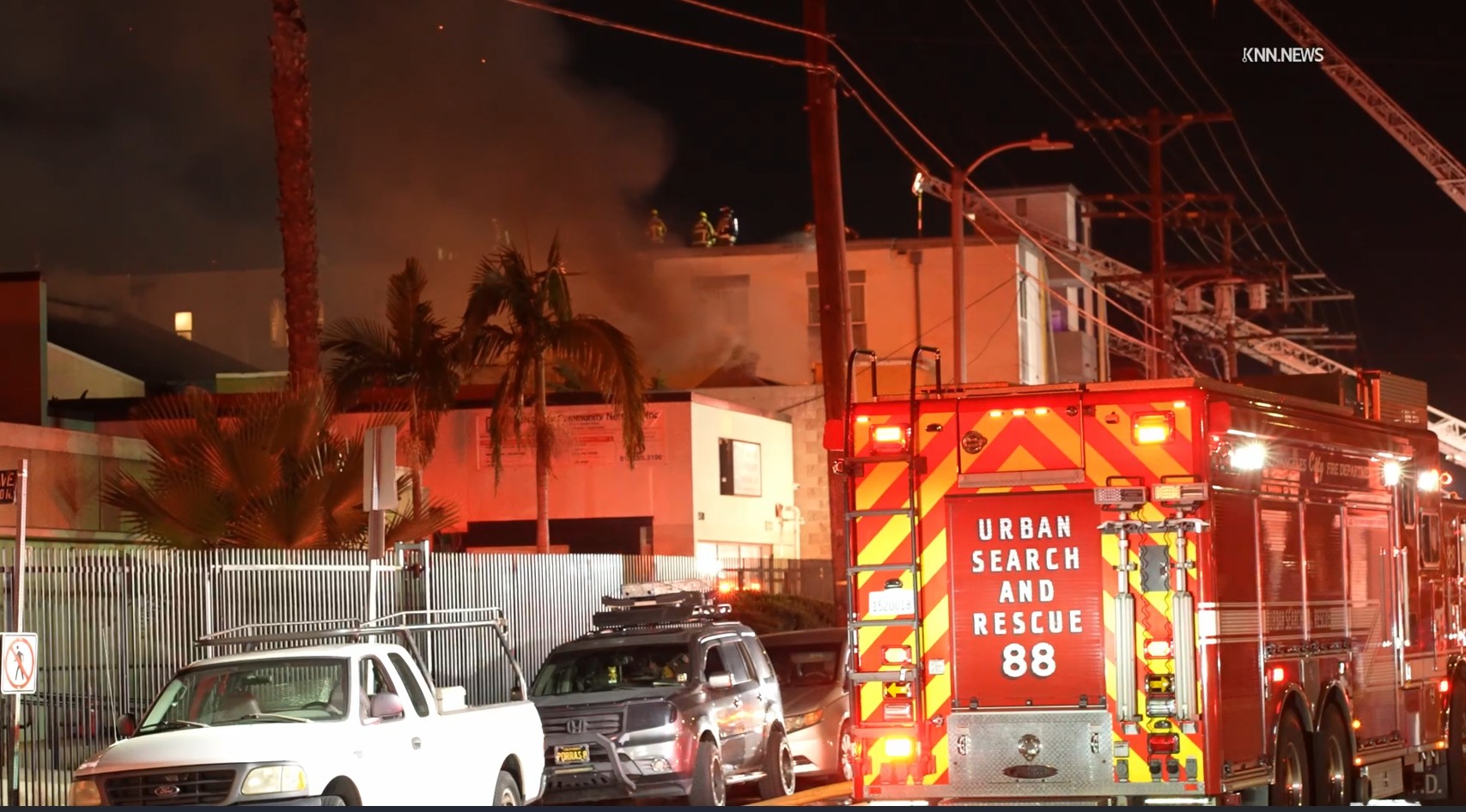 Los Angeles firefighters battle a major emergency fire on Tuesday,...