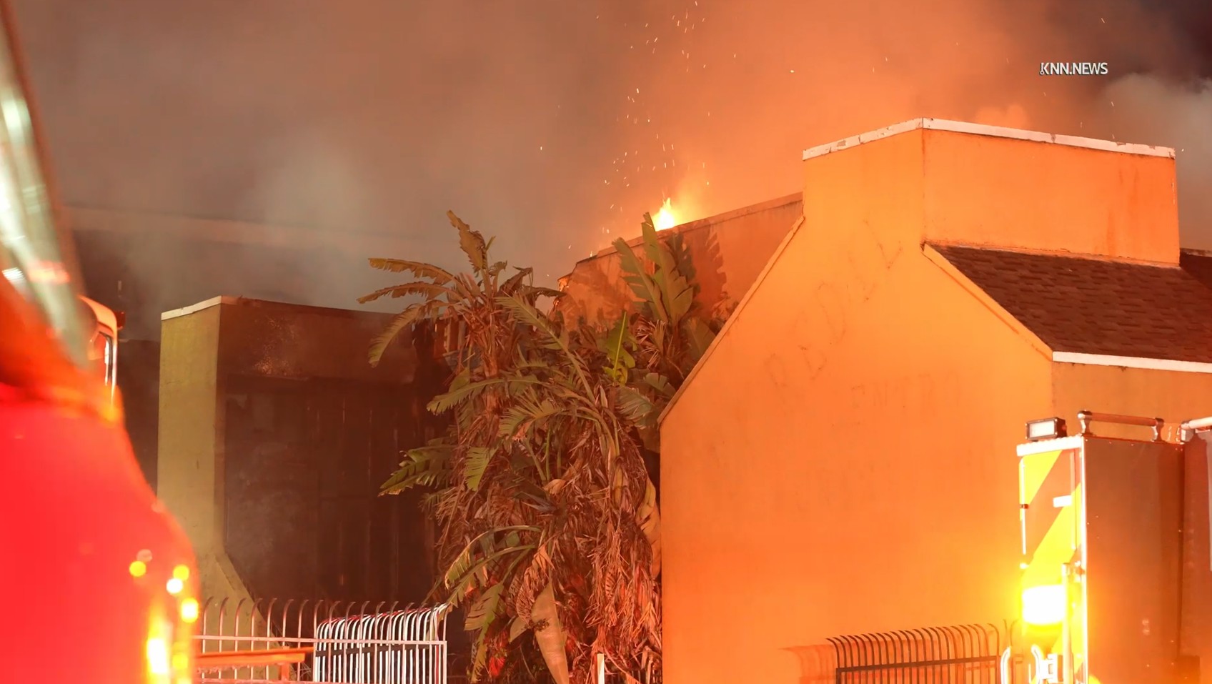 Los Angeles firefighters battle a major emergency fire on Tuesday,...