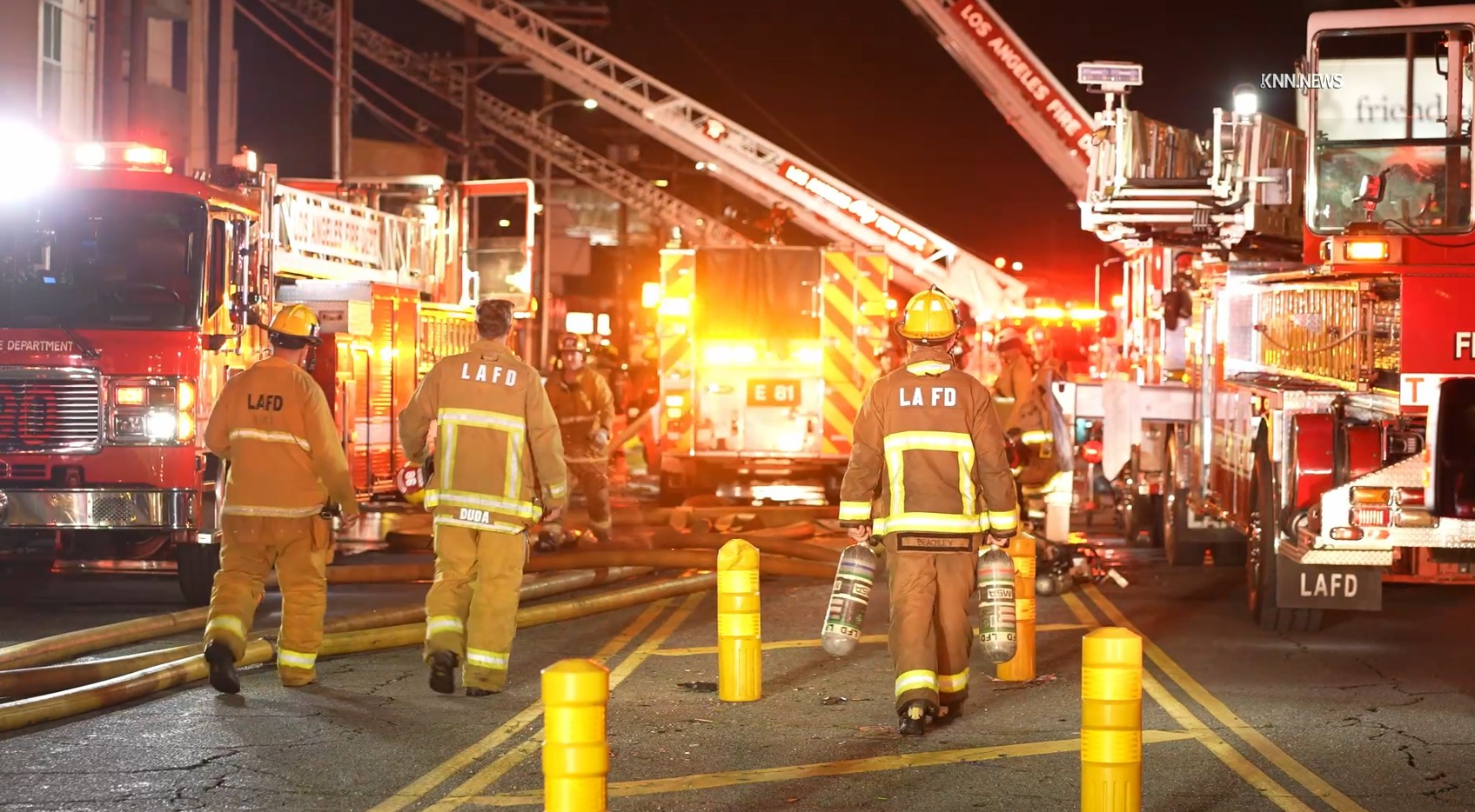 Los Angeles firefighters battle a major emergency fire on Tuesday,...
