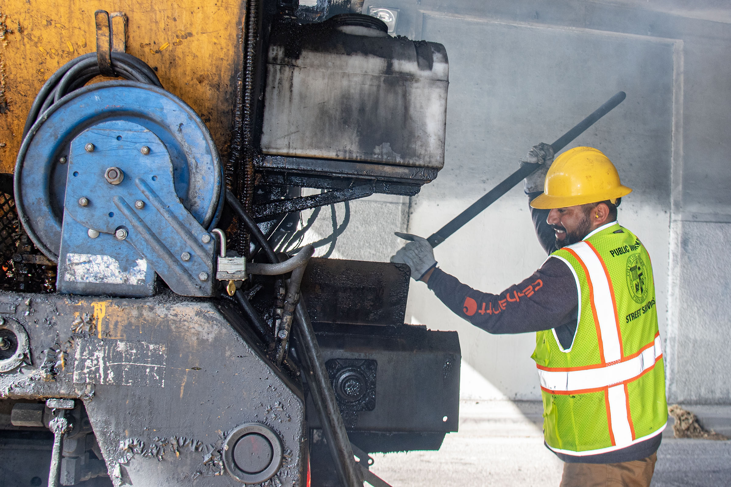 LA city workers repair potholes after a series of rainstorms...