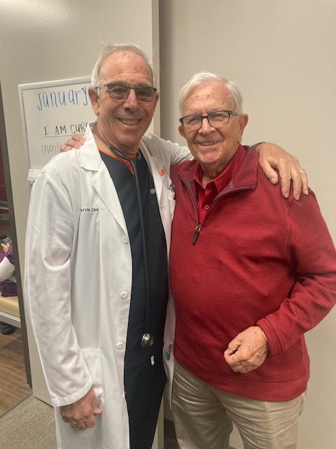 Press-Telegram columnist Rich Archbold, right, a patient since 1978, attends...