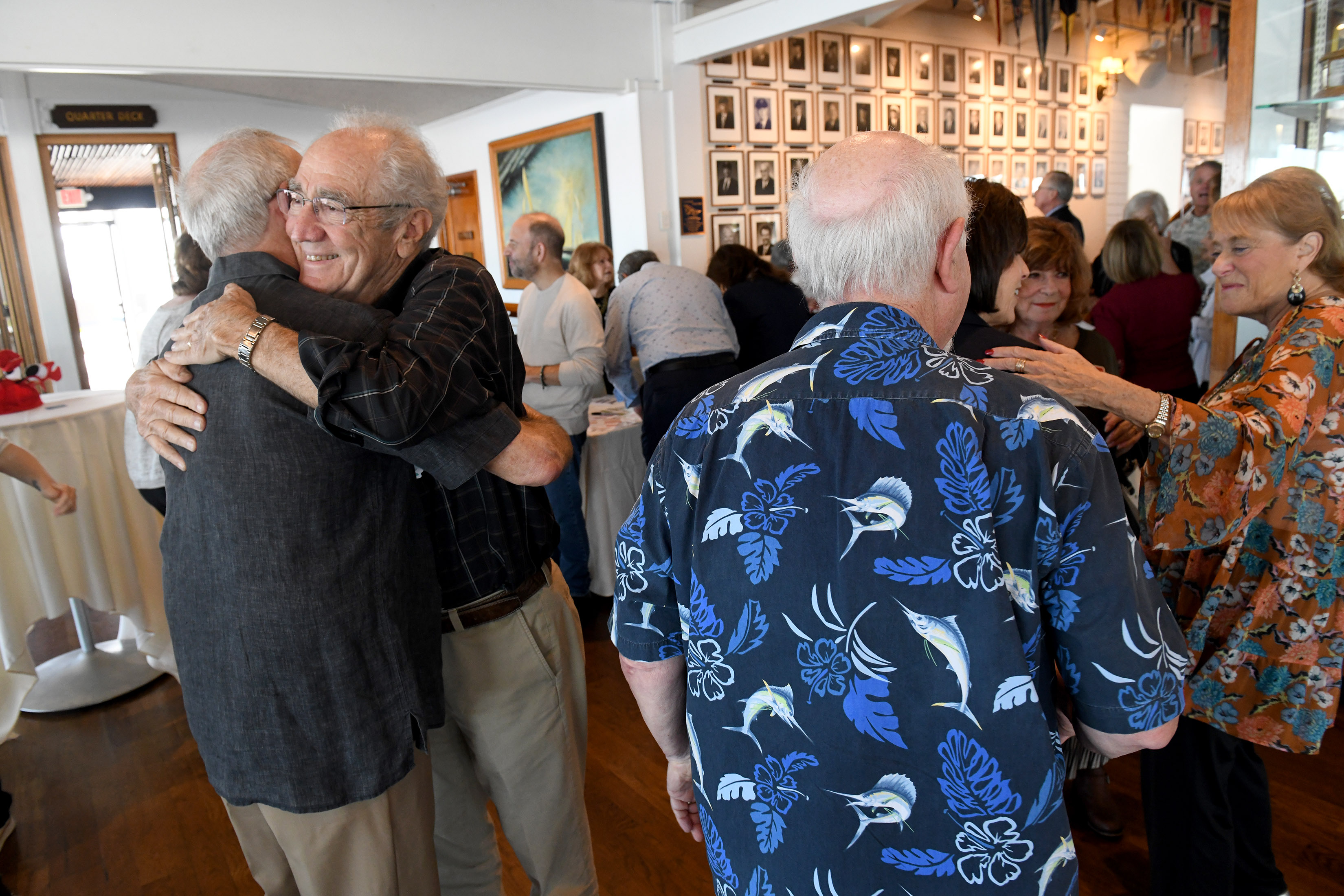 Dr. Jimmy Lindon hugs his friend Dr. Marvin Zamost, a...