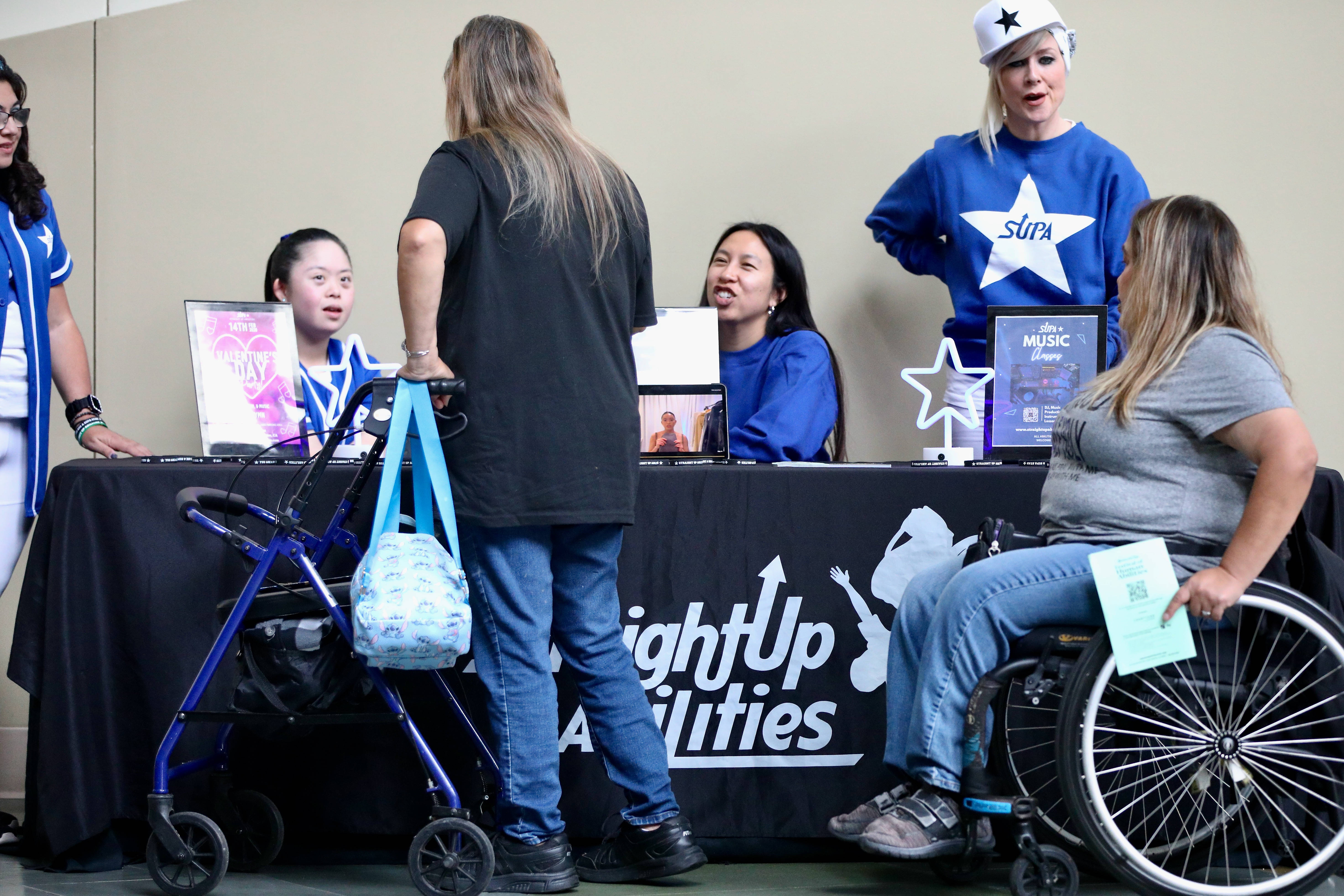 Attendees check out the resource booths at the 23rd annual...